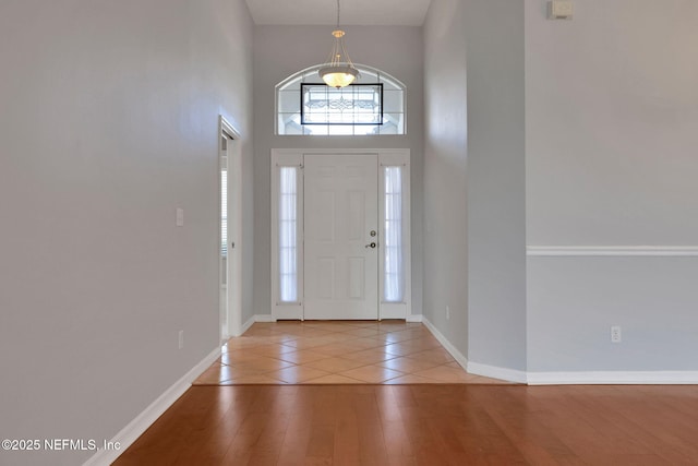 644 Casa Fuerta Ln, Saint Augustine, FL 32080 - entrance foyer featuring wood finished floors and a towering ceiling