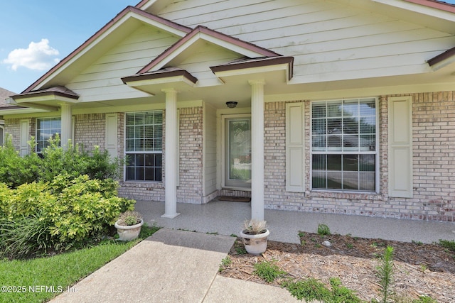 1835 Harbor Island Dr, Fleming Island, FL 32003 - property entrance featuring brick siding