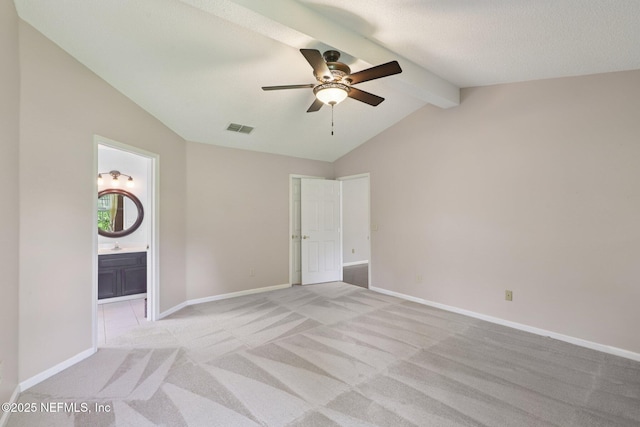 1835 Harbor Island Dr, Fleming Island, FL 32003 - unfurnished bedroom with light colored carpet, connected bathroom, and a ceiling fan