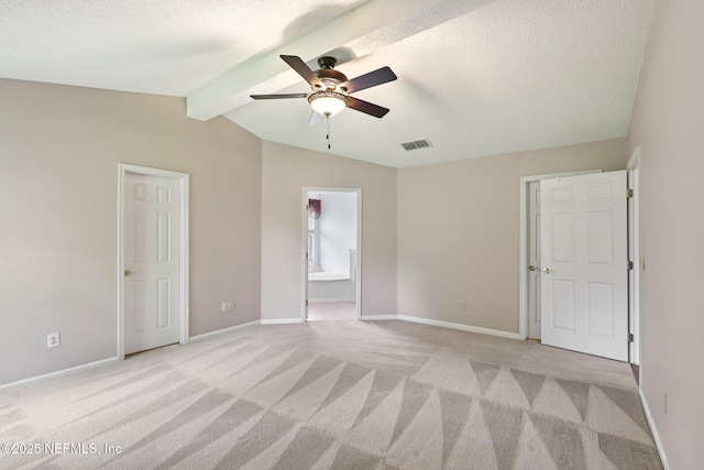 1835 Harbor Island Dr, Fleming Island, FL 32003 - unfurnished bedroom with light carpet, ensuite bath, a textured ceiling, and ceiling fan