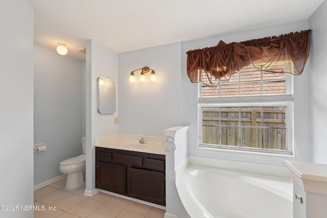 1835 Harbor Island Dr, Fleming Island, FL 32003 - bathroom with vanity, a bath, healthy amount of natural light, tile patterned flooring, and a textured ceiling