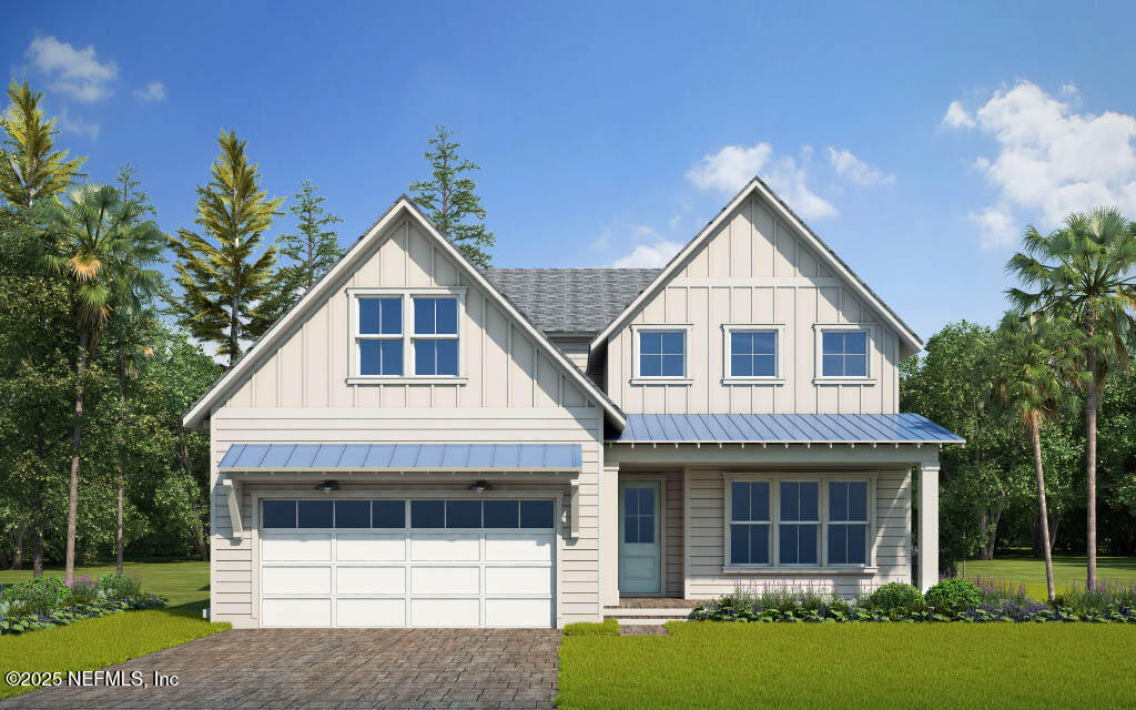 0 Jefferson Ave, Ponte Vedra Beach, FL 32082 - view of front of home featuring board and batten siding, a front yard, a standing seam roof, and an attached garage