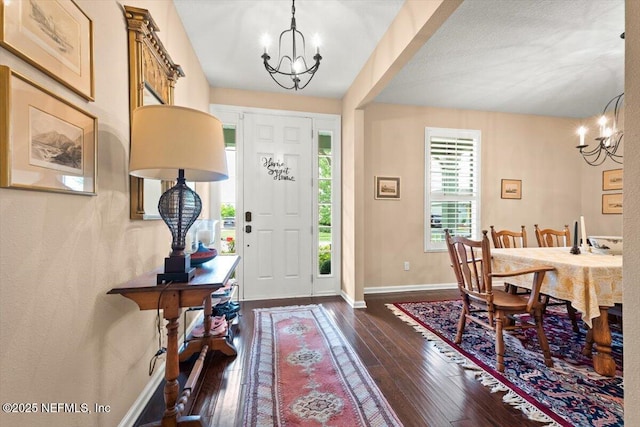 141 Mediterra Ave, Ponte Vedra, FL 32081 - entryway featuring a chandelier and dark wood-style flooring