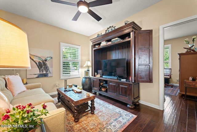 141 Mediterra Ave, Ponte Vedra, FL 32081 - living room featuring a ceiling fan and dark wood-style flooring