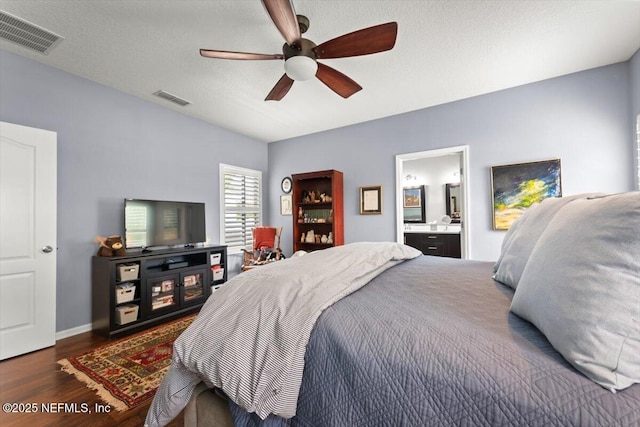 141 Mediterra Ave, Ponte Vedra, FL 32081 - bedroom with wood finished floors, ceiling fan, and ensuite bathroom