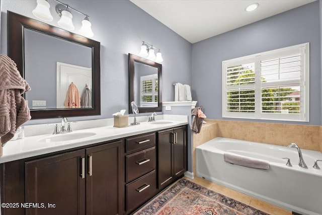 141 Mediterra Ave, Ponte Vedra, FL 32081 - bathroom featuring double vanity, a bath, and tile patterned floors