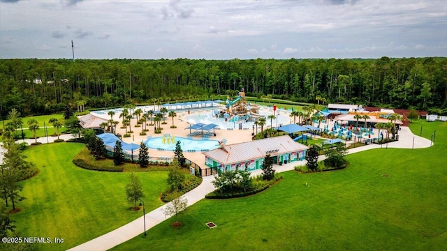 141 Mediterra Ave, Ponte Vedra, FL 32081 - drone / aerial view of a pool and a heavily wooded area