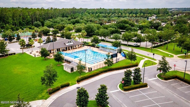 141 Mediterra Ave, Ponte Vedra, FL 32081 - bird's eye view of a pool and a forest