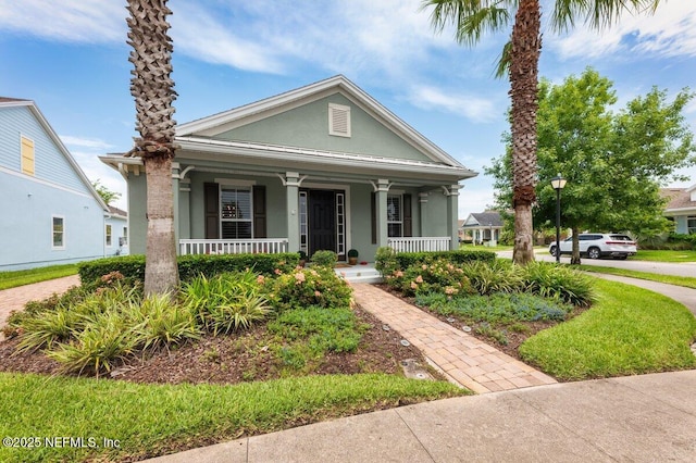 141 Mediterra Ave, Ponte Vedra, FL 32081 - view of front of property with covered porch and stucco siding