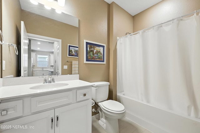 129 Oyster Shell Ter, Ponte Vedra, FL 32081 - full bathroom featuring vanity, shower / tub combo with curtain, a textured wall, and tile patterned flooring