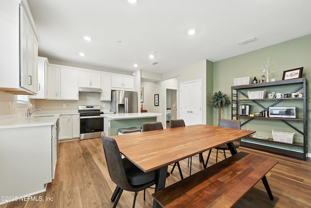 129 Oyster Shell Ter, Ponte Vedra, FL 32081 - dining room featuring light wood-style flooring and recessed lighting