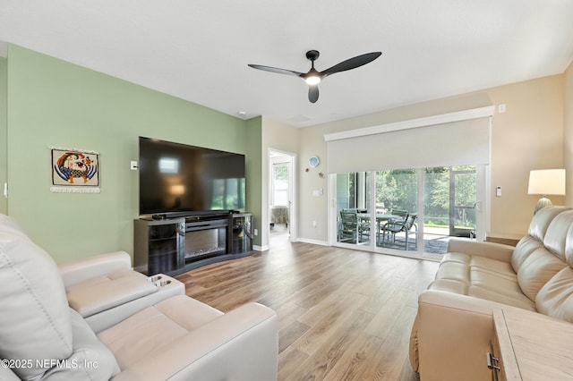 129 Oyster Shell Ter, Ponte Vedra, FL 32081 - living area with light wood-style floors and a ceiling fan