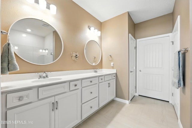 129 Oyster Shell Ter, Ponte Vedra, FL 32081 - bathroom featuring double vanity and a shower