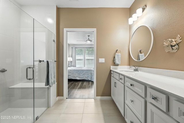 129 Oyster Shell Ter, Ponte Vedra, FL 32081 - full bath featuring vanity, a shower stall, connected bathroom, tile patterned flooring, and ceiling fan