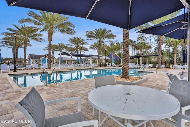 129 Oyster Shell Ter, Ponte Vedra, FL 32081 - community pool with a patio area
