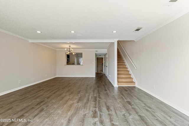 7855 La Sierra Ct Unit 7855, Jacksonville, FL 32256 - unfurnished living room with stairway, wood finished floors, crown molding, recessed lighting, and a textured ceiling