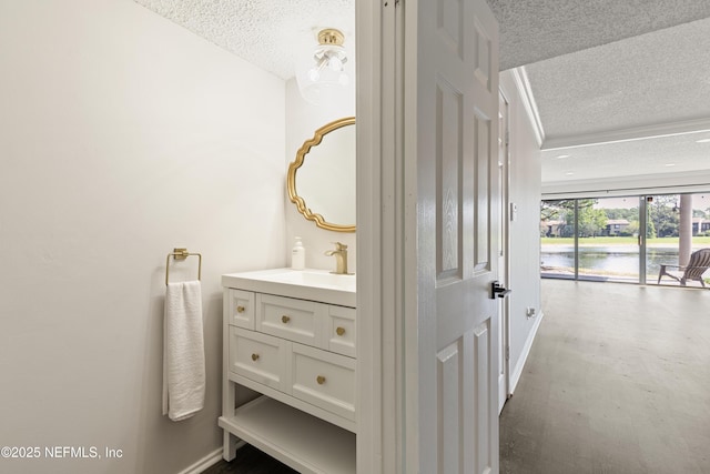 7855 La Sierra Ct Unit 7855, Jacksonville, FL 32256 - bathroom featuring a textured ceiling, vanity, and a water view