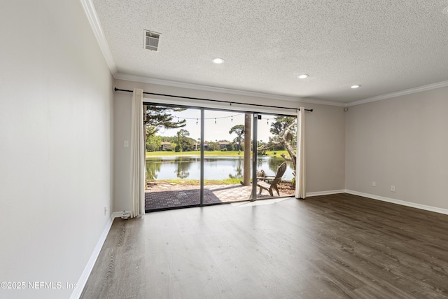 7855 La Sierra Ct Unit 7855, Jacksonville, FL 32256 - empty room featuring a textured ceiling, ornamental molding, wood finished floors, a water view, and recessed lighting