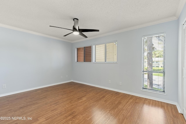 7855 La Sierra Ct Unit 7855, Jacksonville, FL 32256 - empty room featuring a textured ceiling, wood finished floors, ceiling fan, and ornamental molding