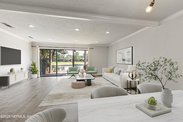 7855 La Sierra Ct Unit 7855, Jacksonville, FL 32256 - living room featuring wood finished floors, a textured ceiling, a water view, recessed lighting, and ornamental molding