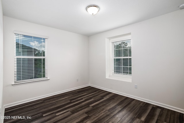 155 Gourd Island Way, Saint Johns, FL 32259 - unfurnished room featuring dark wood finished floors, healthy amount of natural light, and a smoke detector