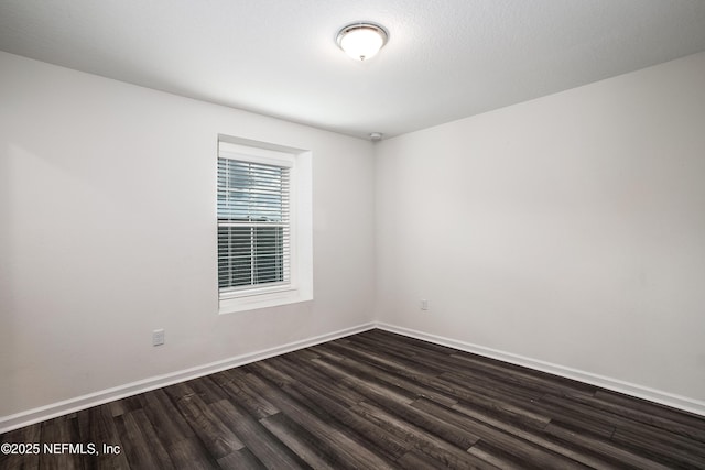 155 Gourd Island Way, Saint Johns, FL 32259 - empty room with dark wood-style flooring and baseboards