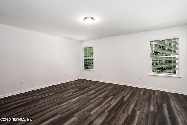 155 Gourd Island Way, Saint Johns, FL 32259 - empty room featuring dark wood-style flooring and baseboards