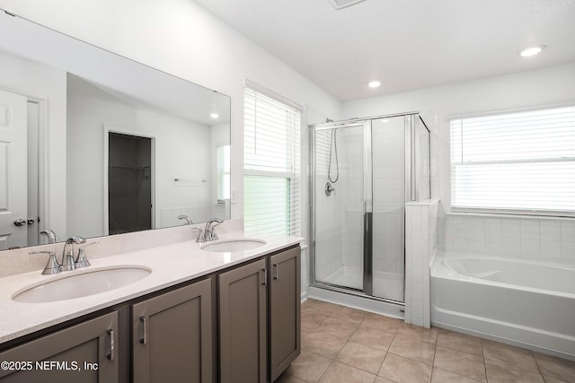 155 Gourd Island Way, Saint Johns, FL 32259 - full bathroom featuring a stall shower, a bath, double vanity, tile patterned flooring, and recessed lighting