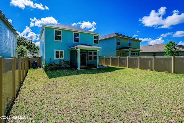 155 Gourd Island Way, Saint Johns, FL 32259 - rear view of house featuring a sunroom and a fenced backyard