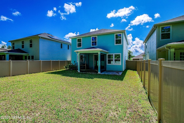 155 Gourd Island Way, Saint Johns, FL 32259 - back of property with a sunroom and a fenced backyard