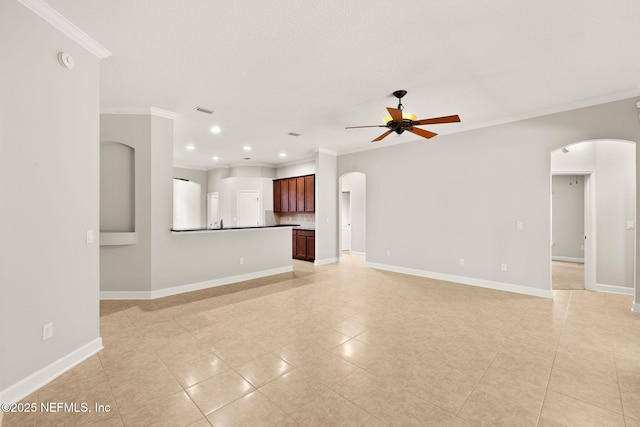 100 Cummer Way, Saint Augustine, FL 32095 - unfurnished living room with arched walkways, crown molding, ceiling fan, light tile patterned floors, and recessed lighting