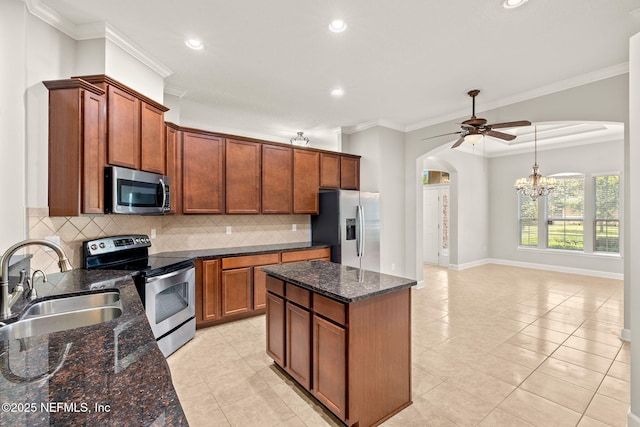 100 Cummer Way, Saint Augustine, FL 32095 - kitchen featuring stainless steel appliances, arched walkways, a chandelier, tasteful backsplash, and ceiling fan