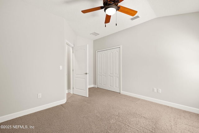 100 Cummer Way, Saint Augustine, FL 32095 - unfurnished bedroom featuring carpet floors, vaulted ceiling, a closet, and ceiling fan