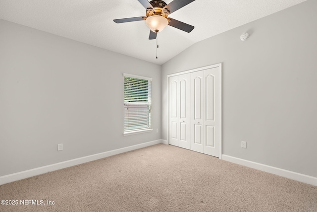 100 Cummer Way, Saint Augustine, FL 32095 - unfurnished bedroom with carpet, lofted ceiling, a closet, and ceiling fan