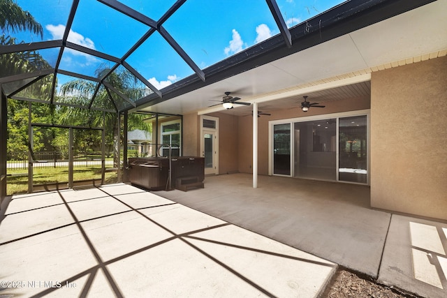 100 Cummer Way, Saint Augustine, FL 32095 - view of patio / terrace with a hot tub, ceiling fan, and glass enclosure