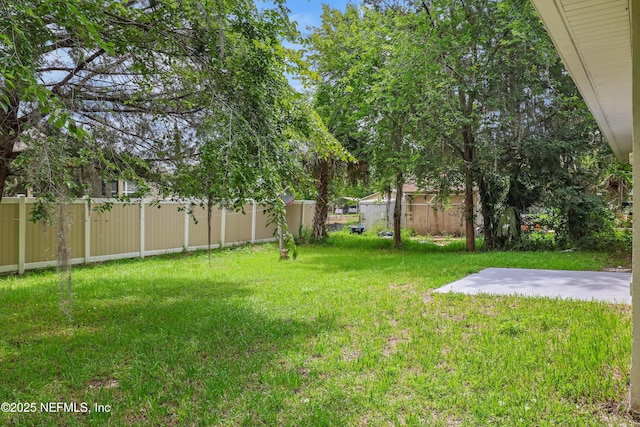 204 S Forsyth Ln, Bunnell, FL 32110 - view of yard featuring a patio area