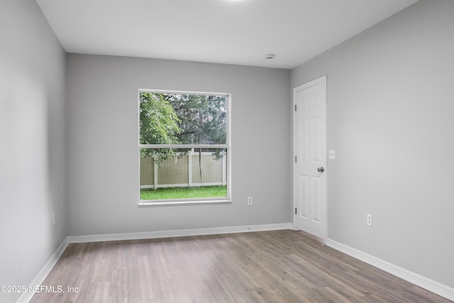204 S Forsyth Ln, Bunnell, FL 32110 - unfurnished room featuring wood finished floors and baseboards