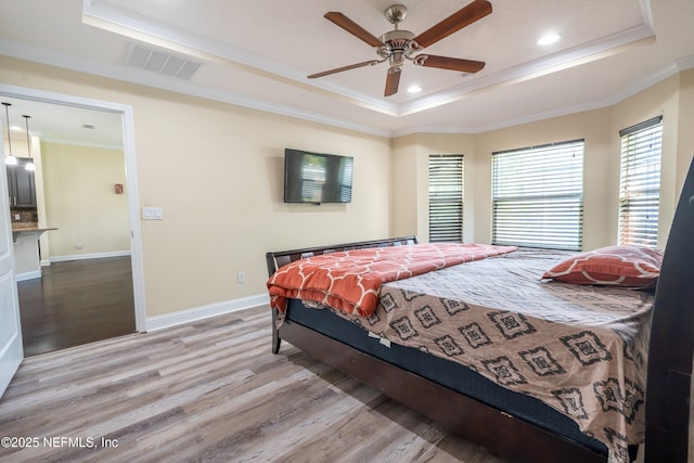 11115 Parkside Preserve Way, Jacksonville, FL 32257 - bedroom featuring a raised ceiling, wood finished floors, crown molding, recessed lighting, and ceiling fan