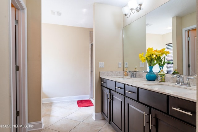 11115 Parkside Preserve Way, Jacksonville, FL 32257 - bathroom with double vanity, tile patterned flooring, and a stall shower