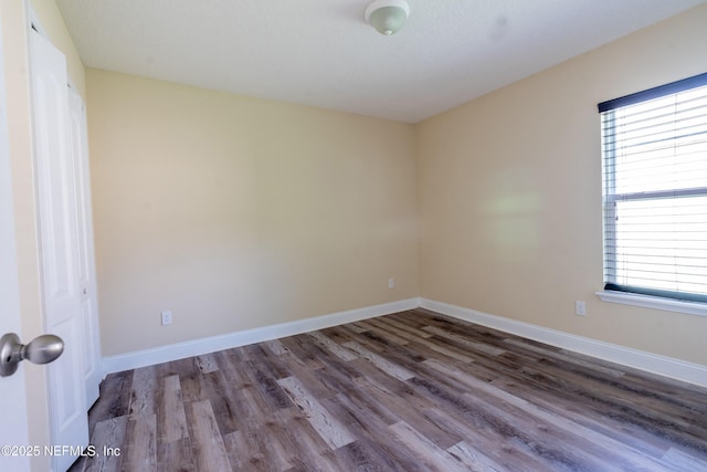 11115 Parkside Preserve Way, Jacksonville, FL 32257 - spare room with wood finished floors