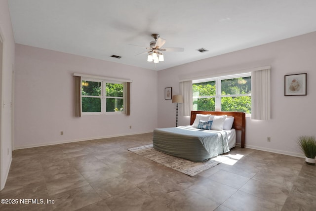 2785 Holly Point Rd E, Orange Park, FL 32073 - bedroom featuring baseboards and a ceiling fan