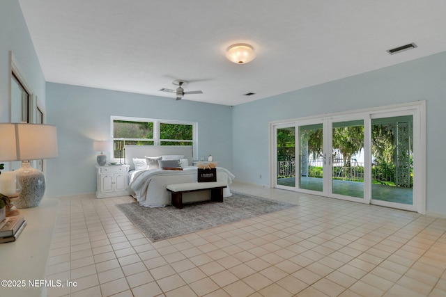 2785 Holly Point Rd E, Orange Park, FL 32073 - bedroom featuring access to exterior and tile patterned floors