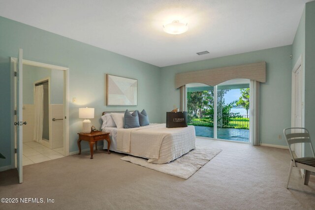 2785 Holly Point Rd E, Orange Park, FL 32073 - bedroom with carpet flooring and access to exterior