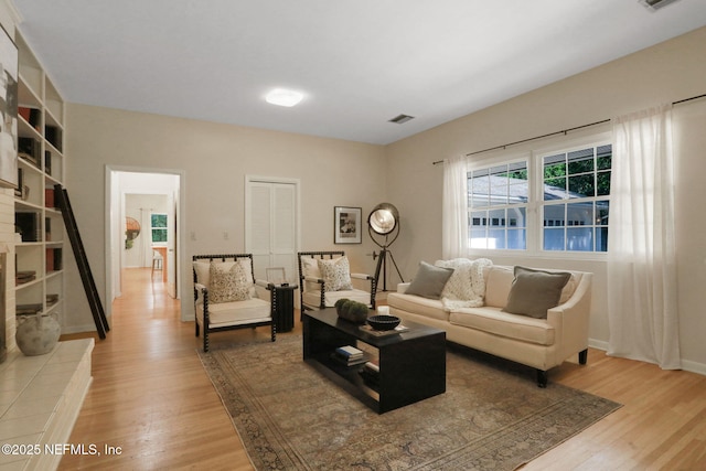 2785 Holly Point Rd E, Orange Park, FL 32073 - living room with light wood-style floors and baseboards