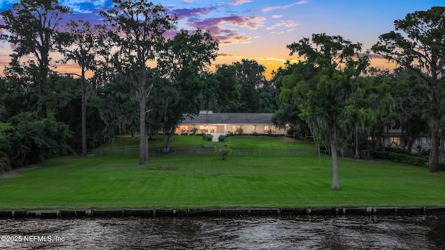 2785 Holly Point Rd E, Orange Park, FL 32073 - yard at dusk featuring a water view and a yard