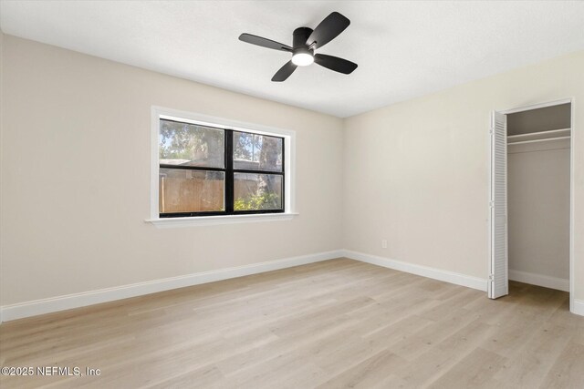 165 Sherry Dr, Atlantic Beach, FL 32233 - unfurnished bedroom featuring light wood-style floors, a closet, and ceiling fan