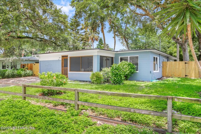 165 Sherry Dr, Atlantic Beach, FL 32233 - view of front of house featuring a sunroom