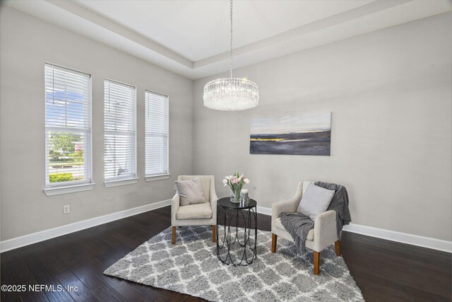 168 Bronson Pkwy, Saint Augustine, FL 32095 - living area featuring a chandelier and hardwood / wood-style floors