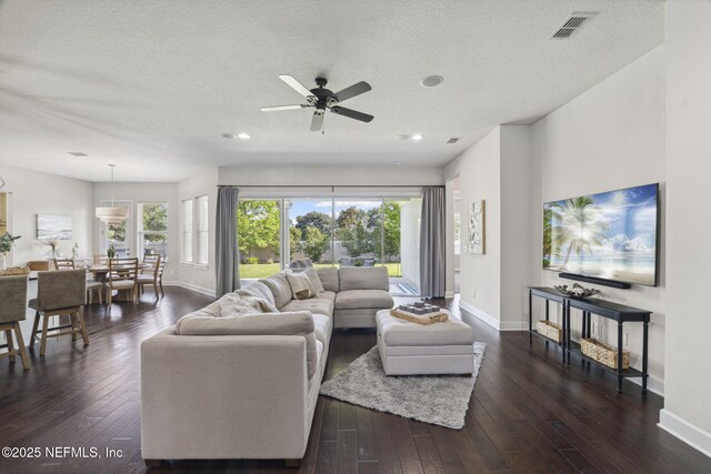 168 Bronson Pkwy, Saint Augustine, FL 32095 - living room with dark wood-type flooring, a ceiling fan, a textured ceiling, and recessed lighting