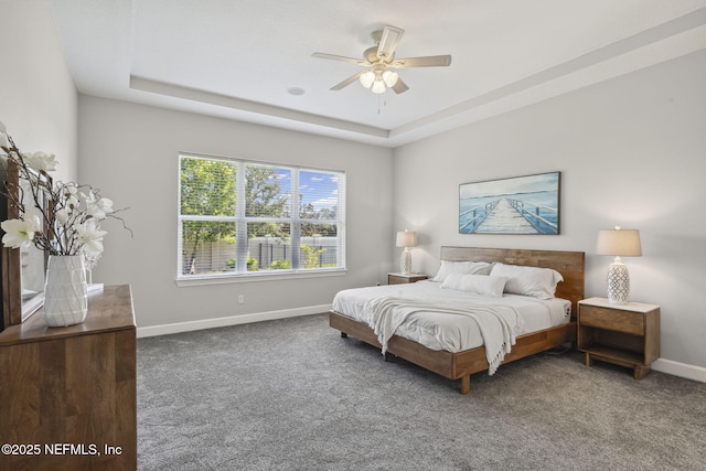 168 Bronson Pkwy, Saint Augustine, FL 32095 - carpeted bedroom featuring a tray ceiling and ceiling fan